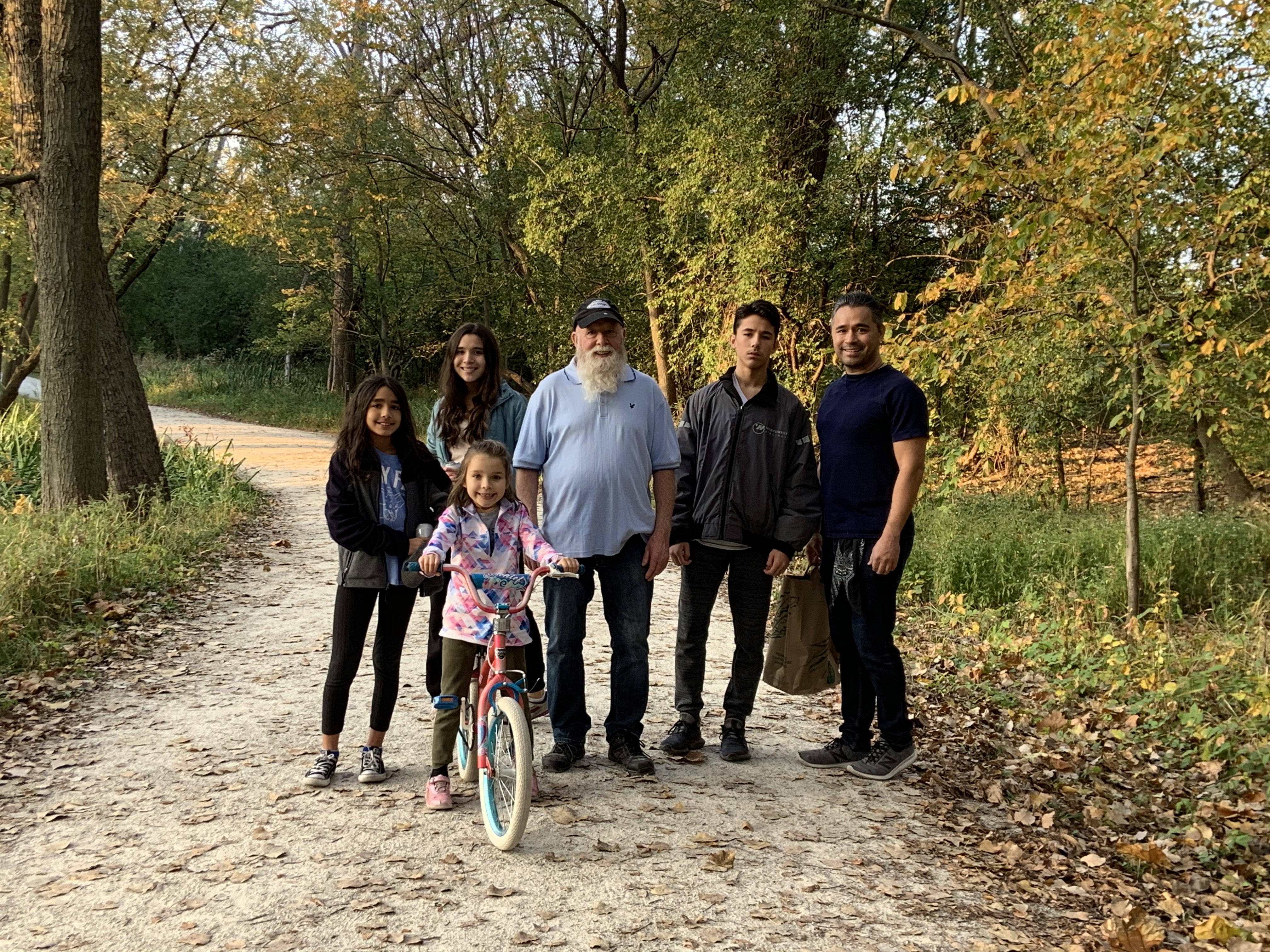 Family walking together on a trail