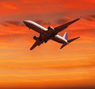 Northwest Airlines plane at sunset